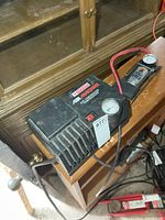 Motomaster air compressor full view on shelf