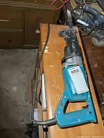 Overall view of Makita reciprocating saw on bench