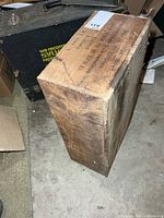 Top of crate showing stencilled text