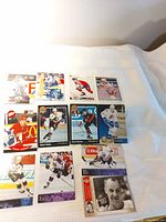 Full set of 12 hockey cards laid out in four rows of three