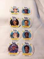 All eight Hostess MLB discs laid out on white cloth