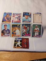 All ten baseball cards laid out on white surface