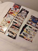 Multiple stacks of NHL trading cards laid out on surface