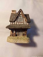 Front view of David Winter Grouse Moor Lodge figurine