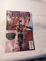 Front cover of Batman Beyond #4 comic in sleeve