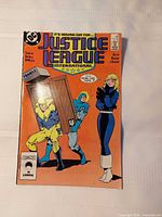Front cover of Justice League International #8 comic
