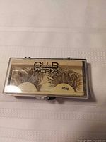 closed Club Works case displaying label and lashes