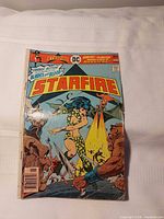 Front cover of Starfire comic showing title, artwork, publisher, price