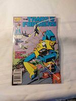 Front cover of Transformers comic in sleeve