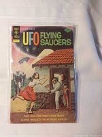 Front cover showing title, artwork, tagline, bagged
