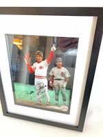 Framed autographed Pete Rose photograph front angle