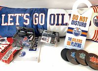 Full lot overview showing pillow, door hanger, sticker sheet, boxed vehicles and coasters