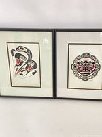 Both framed prints side by side front view
