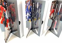 All three boxed mini sticks side view