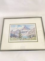 Front view of framed art print showing image, mat and silver frame