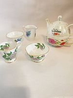 Overall shot of six porcelain pieces laid out