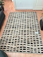 Full view of rug showing pattern, shape, and size relative to flooring