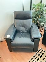 front view of black leather power recliner