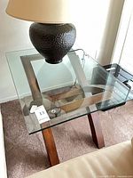 Overall view of glass top end table
