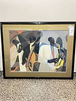Full view of framed abstract jazz print with mat and black glossy frame