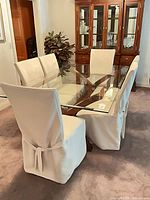 full view of table with six slipcovered chairs