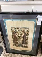 Full view of framed papyrus painting