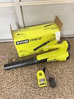 Leaf blower, battery, charger, original box overview