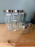 Group shot of all six glass canisters/jars