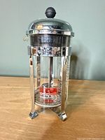 Front view of Bodum French press showing label and frame