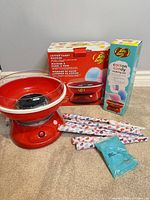 Red Jelly Belly cotton candy machine, boxes, accessories