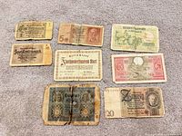 Group shot of all eight banknotes front sides