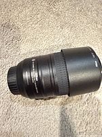 Lens side view showing model markings and exterior condition