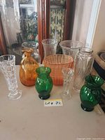 Group shot of all ten vases on table