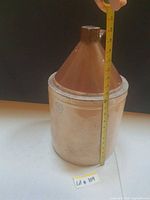 Full view measuring height of stoneware jug