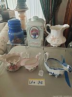 Group shot of all six porcelain jars and creamers