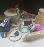 overview of lot showing wooden boxes, sewing basket, hoops, thread, reed, elastic, crochet item