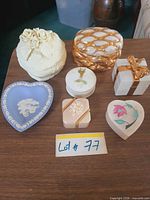 All seven lidded trinket boxes displayed together
