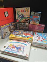 Group shot of all nine boxed items on table