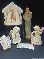 All five figurines grouped together