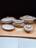 All five vessels and three lids grouped