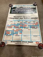 Full view of vertical 1981 Toronto Blue Jays calendar poster with team photo, game schedule and promotional footer