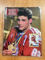 Front view of June 1991 Beckett Hockey Monthly magazine featuring Eric Lindros on cover in protective sleeve