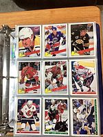 Album page showing 1993-94 Premier base set cards in nine-pocket page