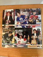 Front view of sealed six-card panel showing all player cards