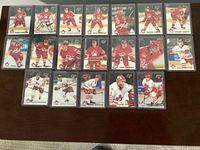 Full set of 19 O-Pee-Chee Premier Team Canada cards in sleeves displayed on table