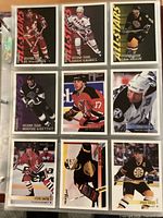 Nine 1994-95 Topps O-Pee-Chee Premier hockey cards in binder page