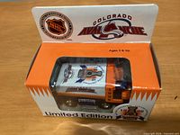 Front and top view of sealed limited edition Colorado Avalanche 1996 Stanley Cup Zamboni in box