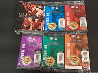 Front view showing binder and six colour-coded sealed packs weeks 1-6