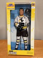 Front view of unopened 1998 Starting Lineup Premier Choice Mario Lemieux 12" figure in box, showing figure, stick, helmet, and packaging details.