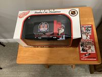 Sealed window box containing 1:24 scale Detroit Red Wings Stanley Cup Champions Zamboni coin bank, limited edition 1 of 1,500